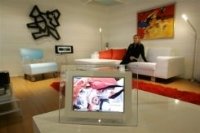 Cadres photos numériques, consoles et portables en vogue à Noël